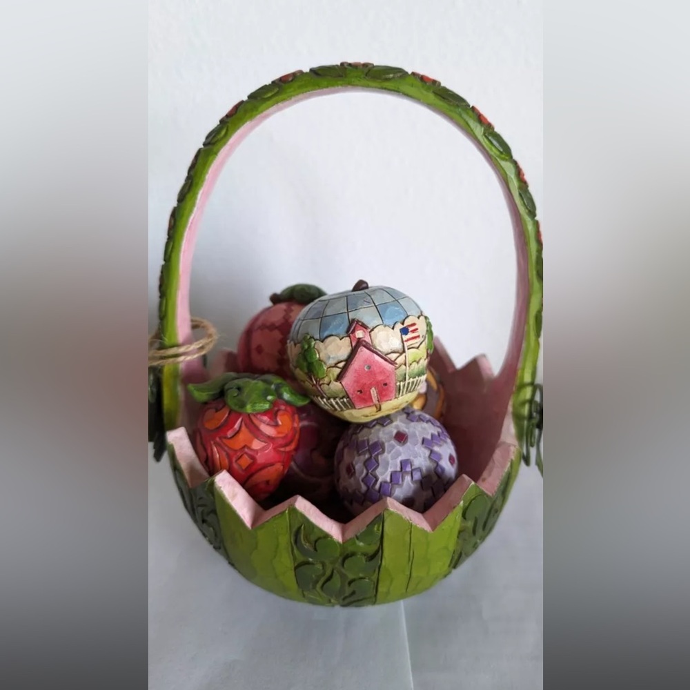Handcrafted Green Basket with Colorful Decorative Eggs
